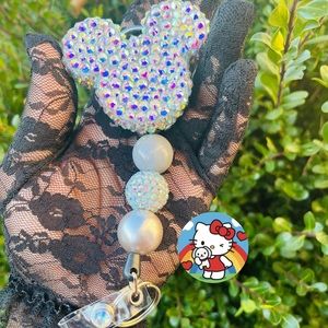 Handmade retractable badge reel with a clasp to easily attach to your uniform